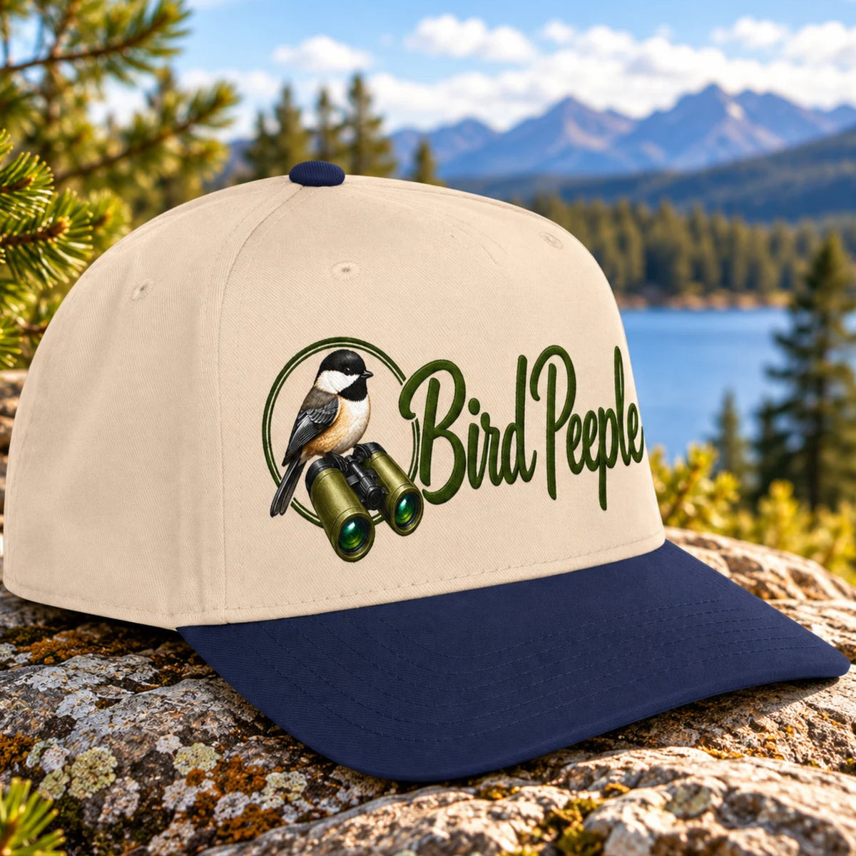 Bird Peeple Birding Hat in Navy and Natural - Chickadee and binoculars logo baseball cap, angled view